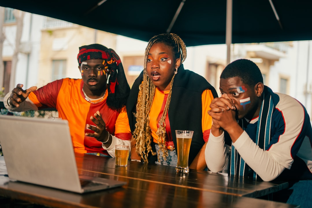 man wears yellow and green jersey shirt