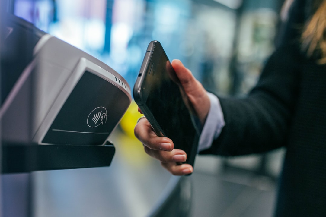 person checking phone payment